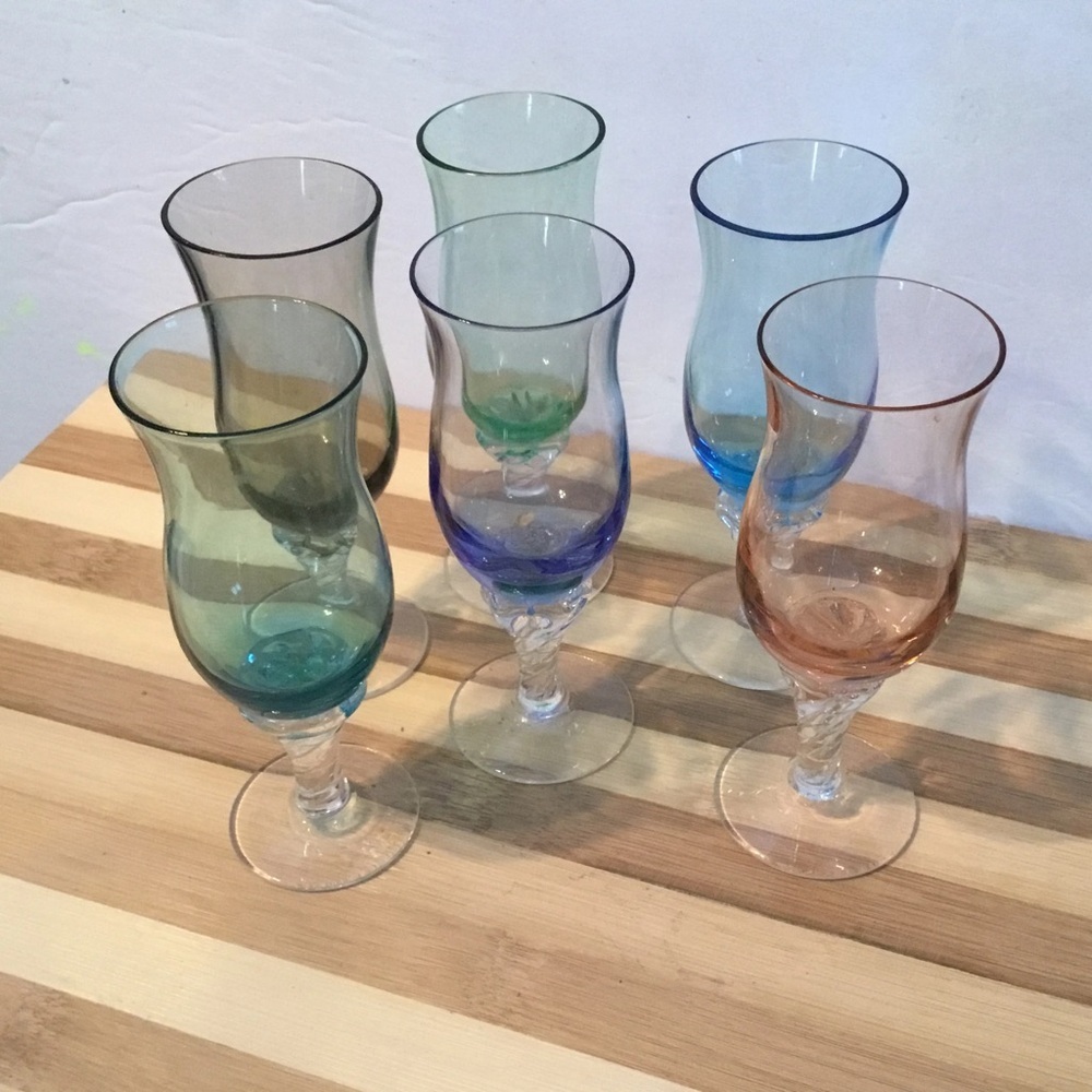 Glass stem tulip shaped glasses, vintage multicoloured sherry or cordial glasses